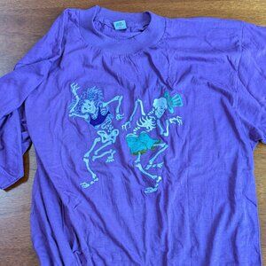 Grateful Dead cotton T-shirt purple with colorful dancing male female skeletons.